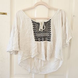 Peasant style blouse with black embroidered pattern